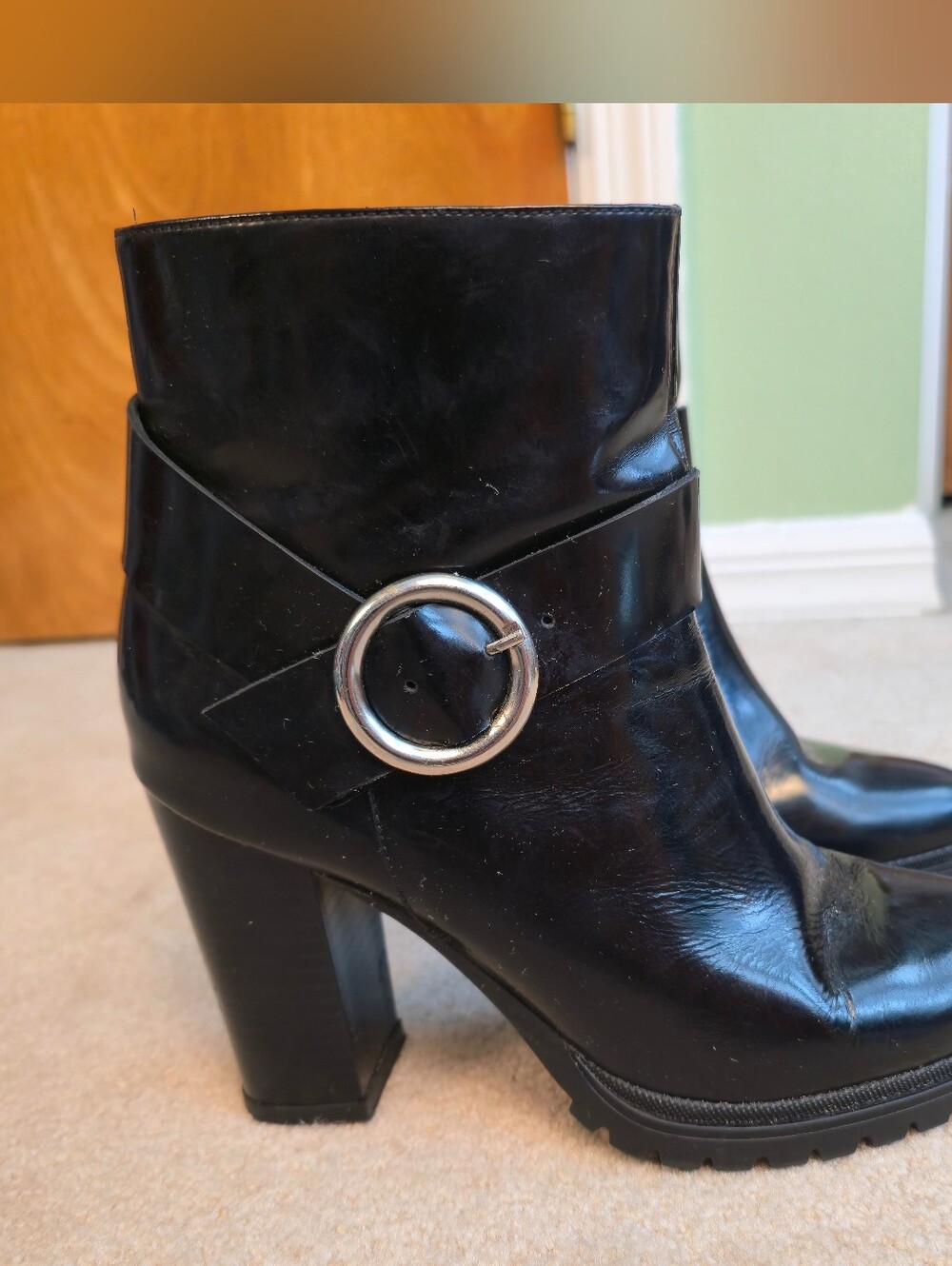 Bosi Ankle boots feature a prominent silver-tone O-ring harness strap Size 8